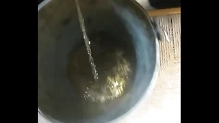 Peeing in a bucket
