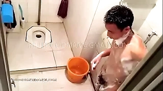 Adult Chinese man attracting a shower